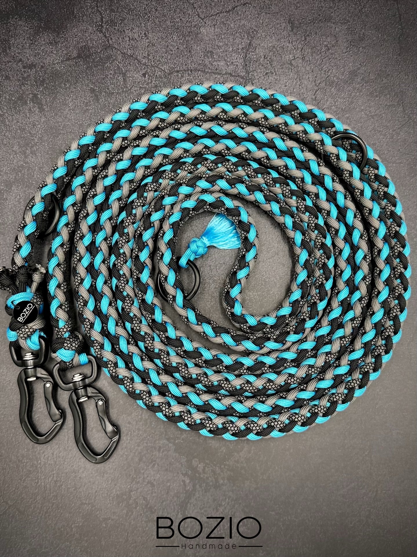 paracord leine hund verstellbar handschlaufe schwarze karabiner aluminium sicherheitskarabiner sicherheit schwarz grau anthrazit tuerkis blau neon grau